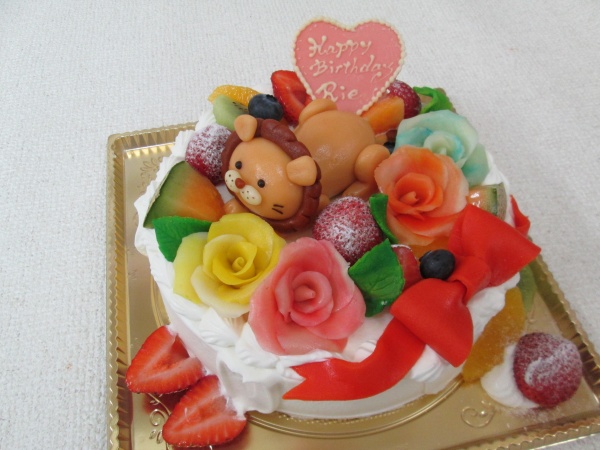 バースデーケーキに バラと赤いリボンデコレーションケーキにライオンを立体で 大阪市東住吉区 パティスリーデコ