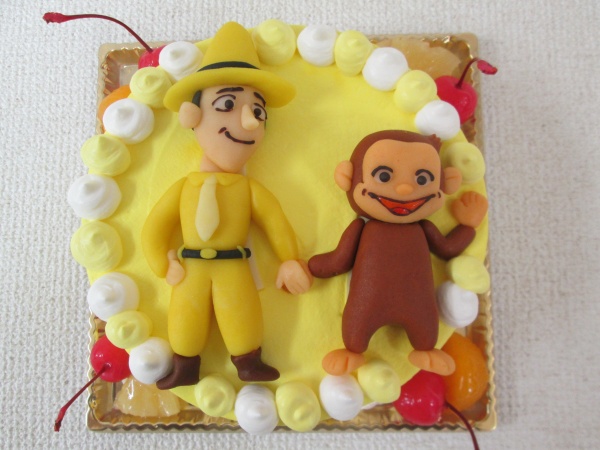 通販ケーキで おさるのジョージと黄色い帽子のおじさんを立体でトッピング 大阪市東住吉区 パティスリーデコ