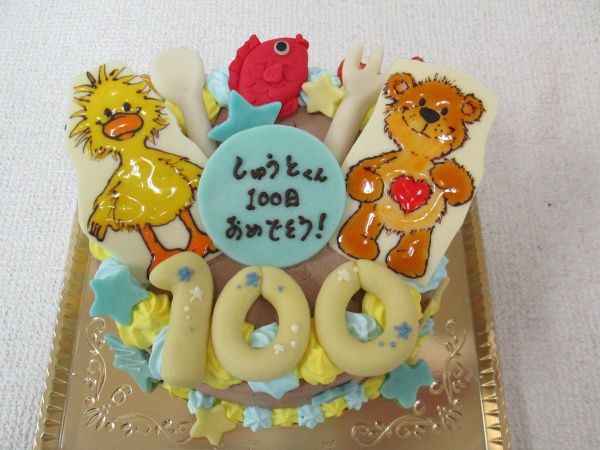 100日のお祝いケーキに スージーズーのクマとアヒルをプレートでナイフやフォークも立体で 大阪市東住吉区 パティスリーデコ