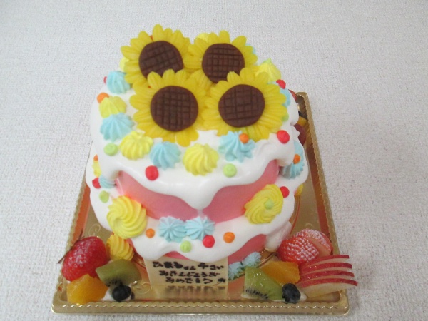 バースデーケーキに 2段ケーキにカラフル絞り仕上げにひまわりの花を立体でトッピング 大阪市東住吉区 パティスリーデコ