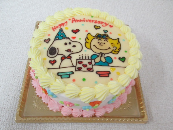 通販ケーキで 指定イラストのスヌーピーとサリーを背景付のプレートでトッピング 大阪市東住吉区 パティスリーデコ